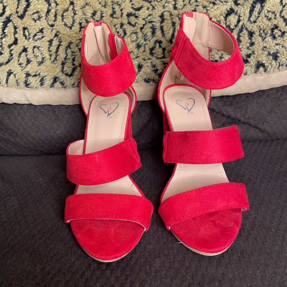 Women’s bright red heels with zipper